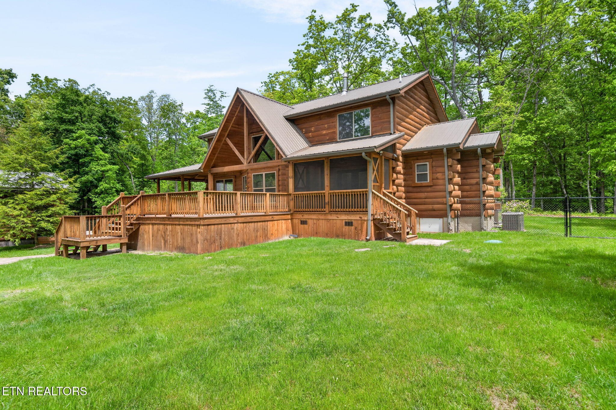 704 White Oak Road Monterey, TN 38574 - Photo 25 of 60 a view of a house with a yard