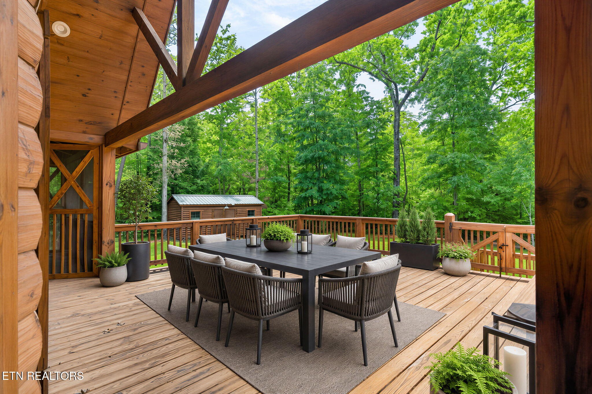 704 White Oak Road Monterey, TN 38574 - Photo 29 of 60 a view of backyard with a table and chairs