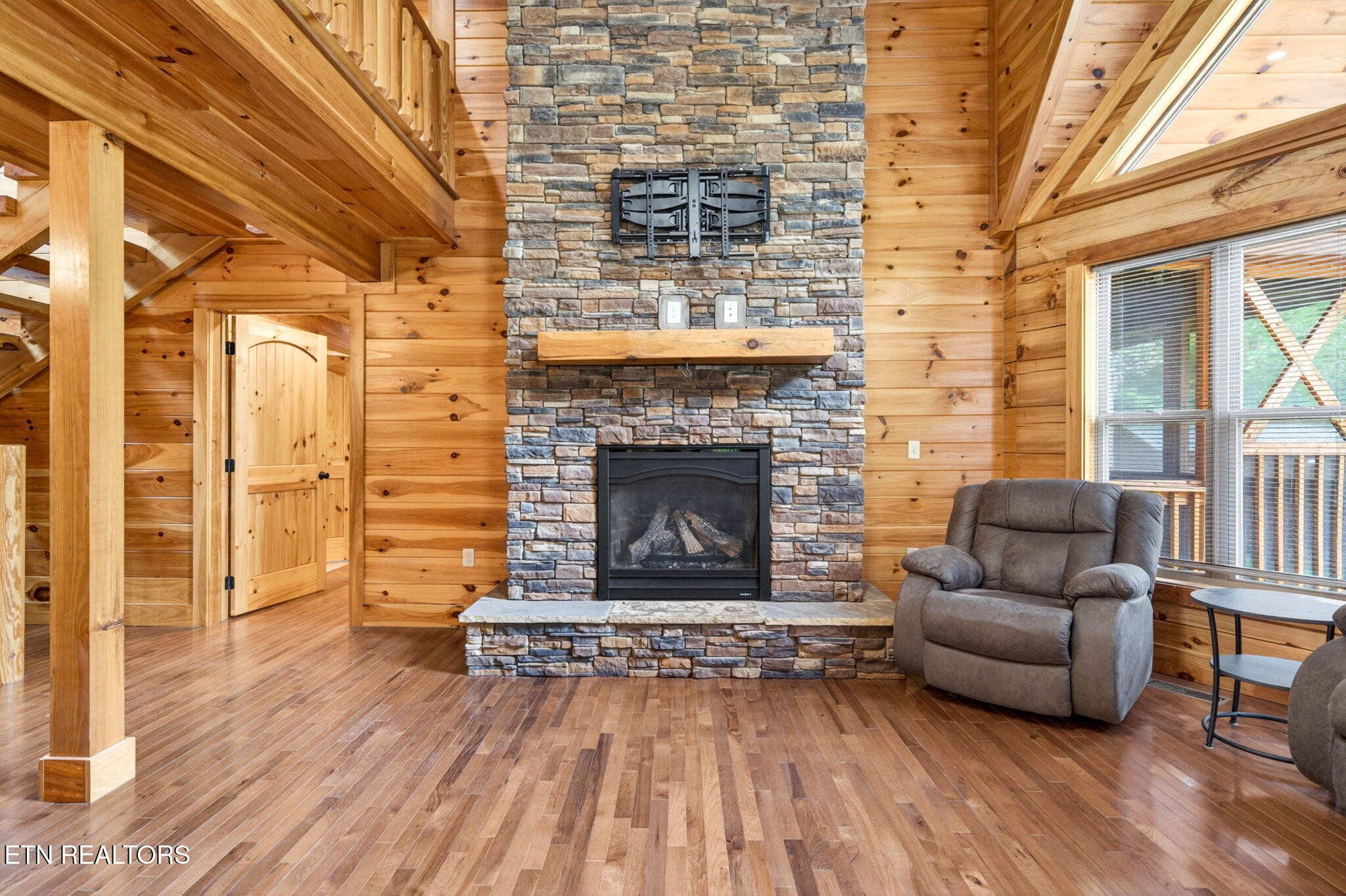 704 White Oak Road Monterey, TN 38574 - Photo 37 of 60 a living room with furniture and a fireplace