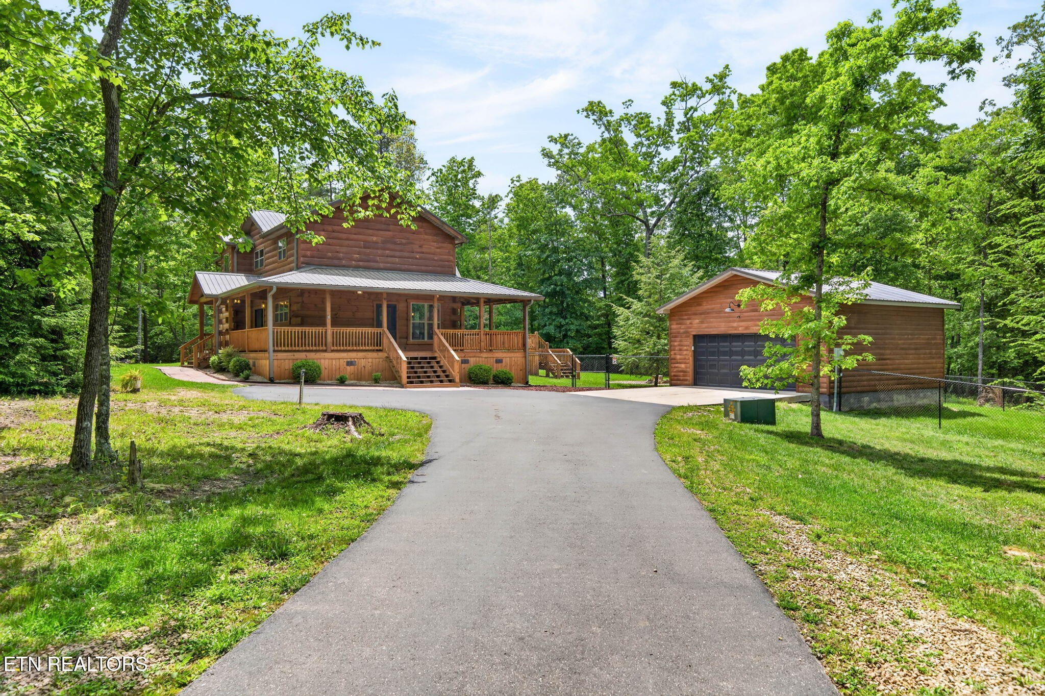 704 White Oak Road Monterey, TN 38574 - Photo 4 of 60 a view of house with a garden