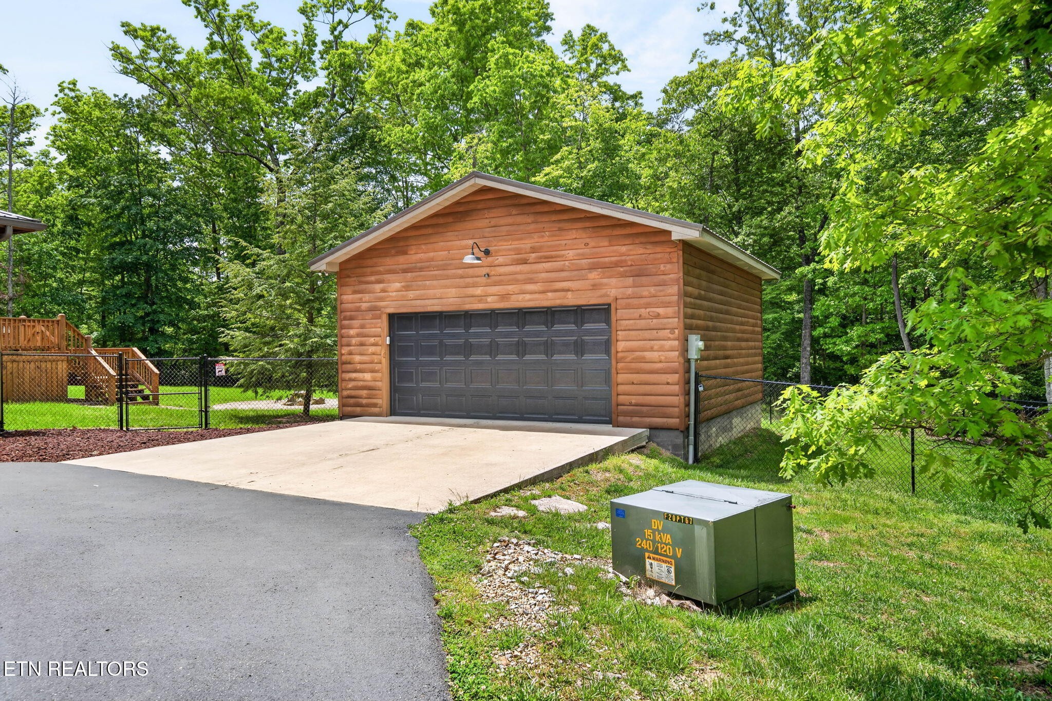 704 White Oak Road Monterey, TN 38574 - Photo 5 of 60 a backyard of a house with table and chairs