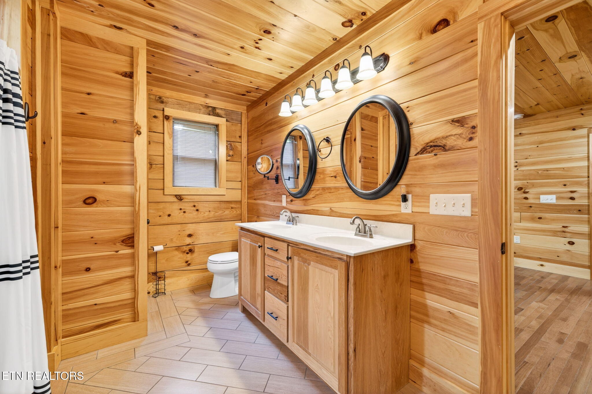 704 White Oak Road Monterey, TN 38574 - Photo 54 of 60 a bathroom with a sink and a mirror