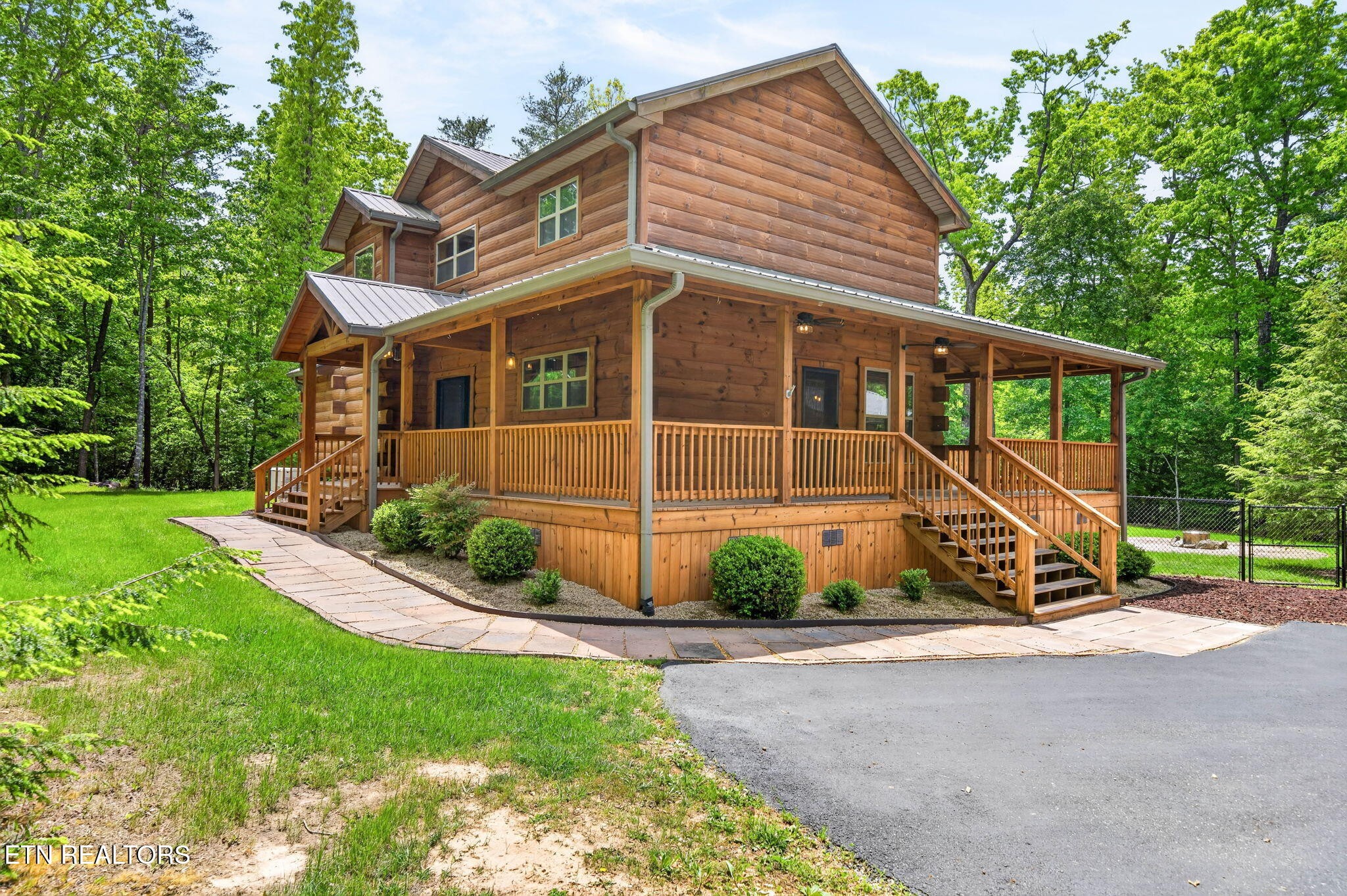 704 White Oak Road Monterey, TN 38574 - Photo 6 of 60 a view of a house with a yard
