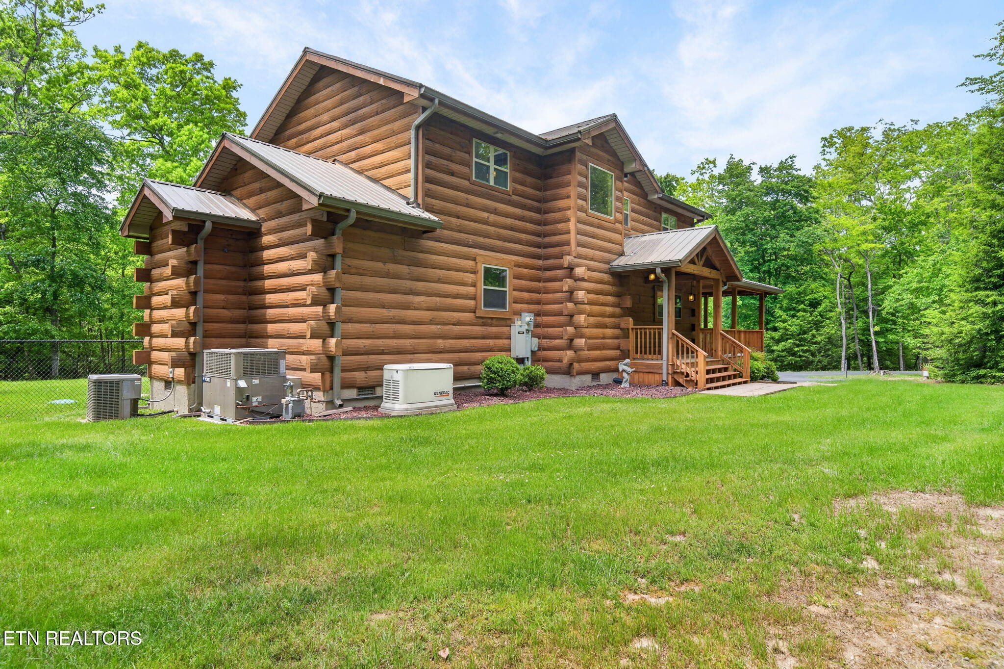704 White Oak Road Monterey, TN 38574 - Photo 9 of 60 a front view of house with yard and green space