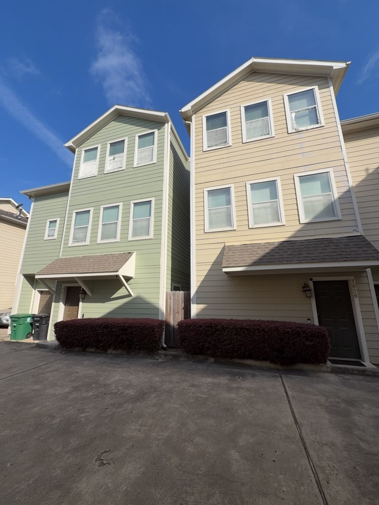 1828 Fletcher Street Houston, TX 77009 - Photo 1 of 9 a front view of a house with parking space