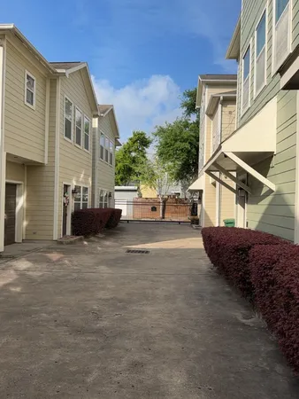 a view of a house with a street