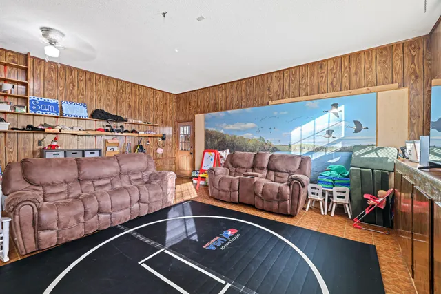 a living room with lots of furniture and a couch