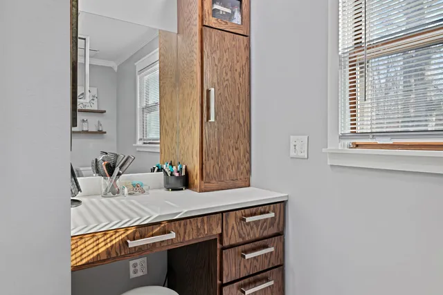 a kitchen with a sink and a window