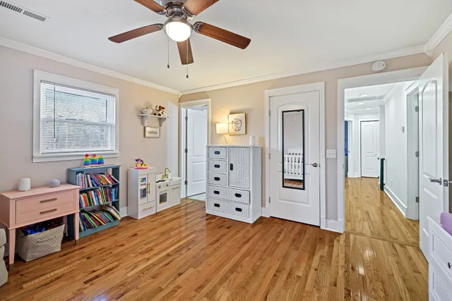 a view of a livingroom with furniture and wooden floor
