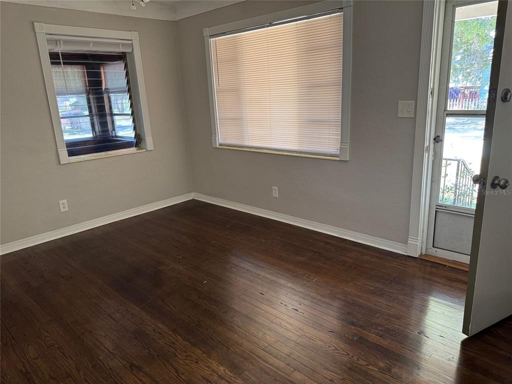 2500 14th Avenue North St. Petersburg, FL 33713 - Photo 9 of 27 an empty room with wooden floor and windows