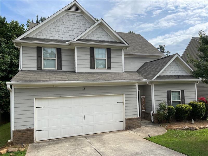 6427 St Mark Way Fairburn, GA 30213 - Photo 1 of 10 a view of a house with a yard and plants