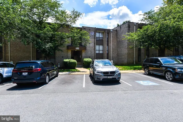 a car parked in front of a house