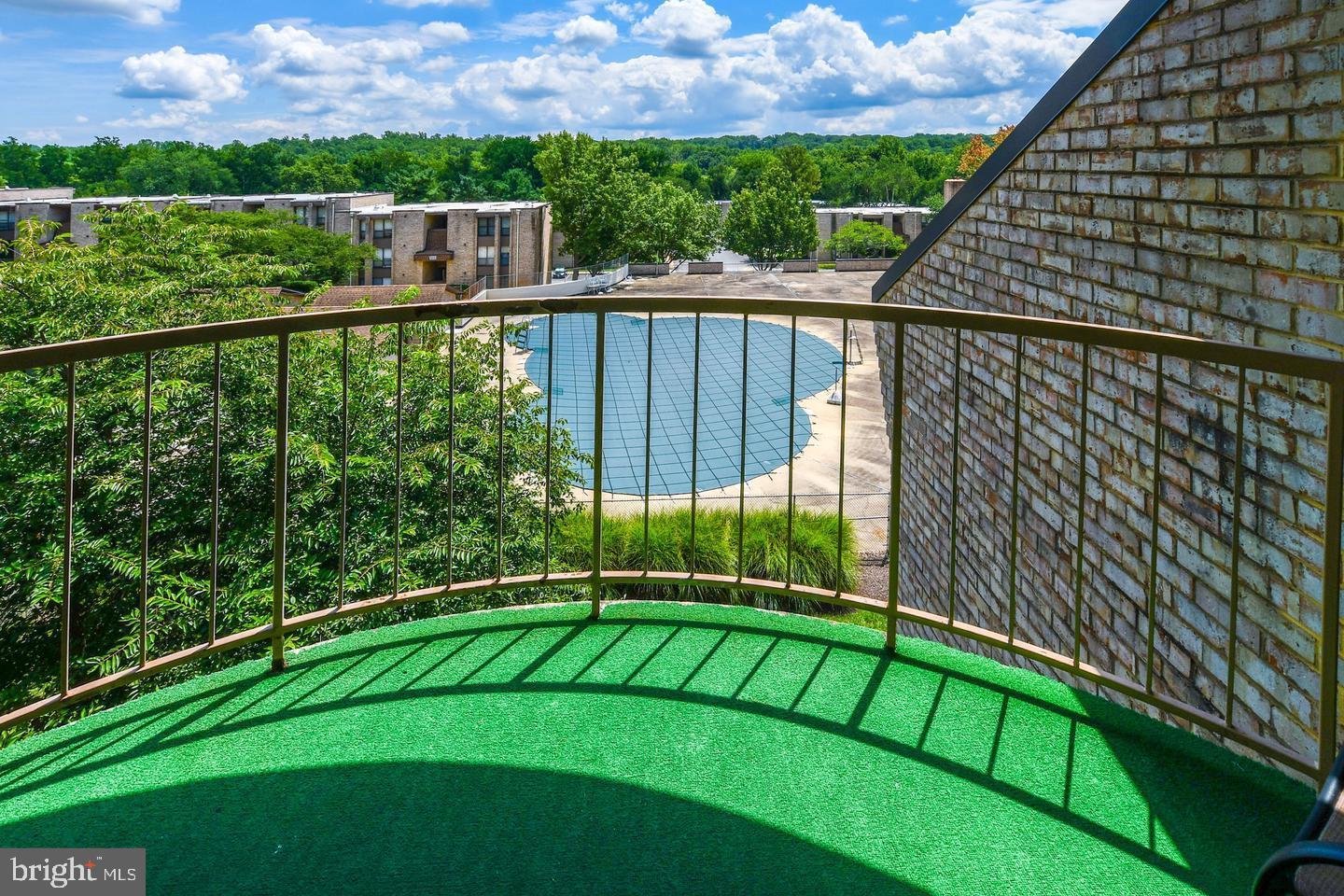 3319 Huntley Square Drive, Unit A Temple Hills, MD 20748 - Photo 15 of 17 a view of a balcony with a garden