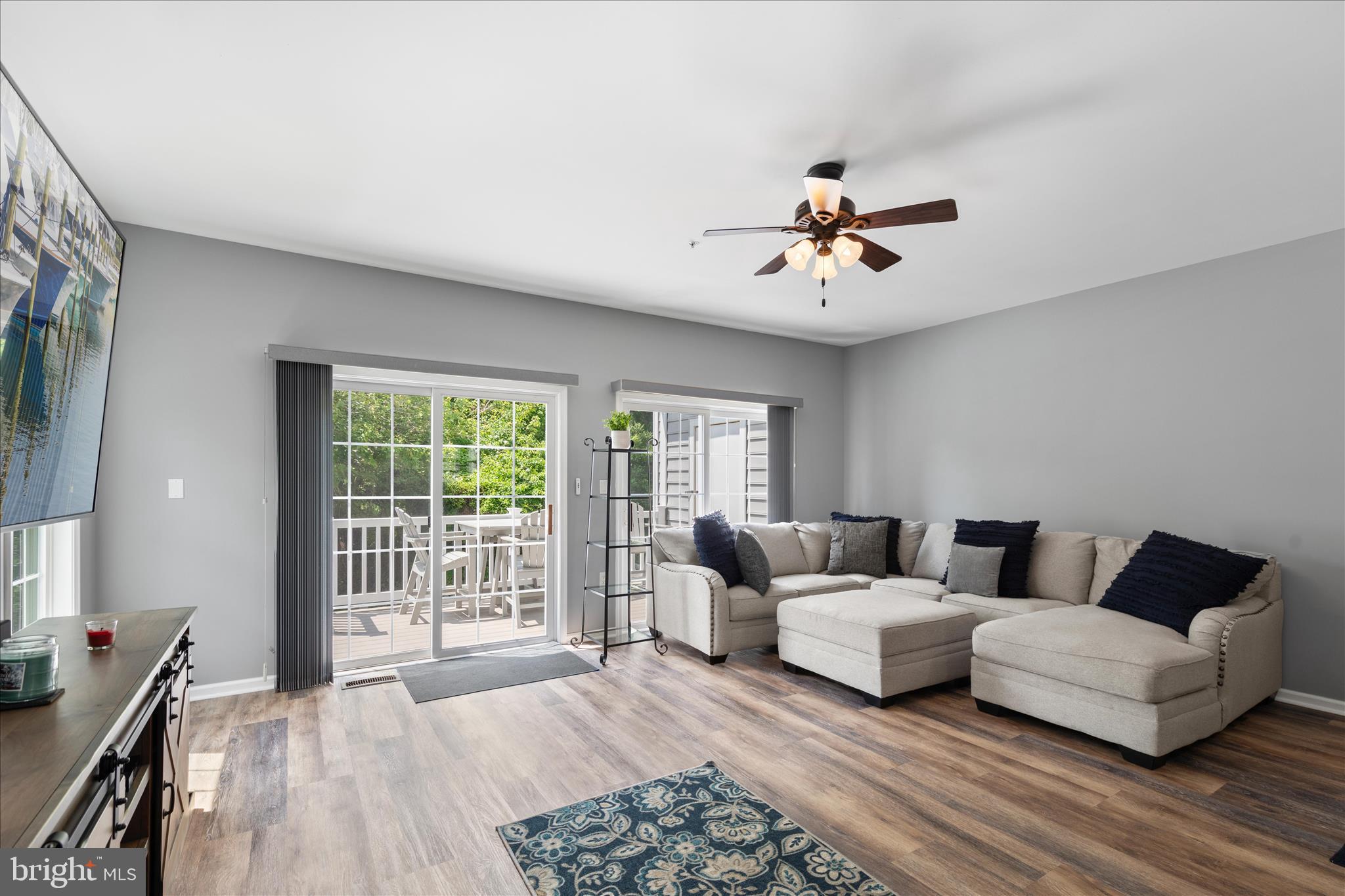 9739 Golf Course Road, Unit D102 Ocean City, MD 21842 - Photo 10 of 78 a living room with furniture and a large window