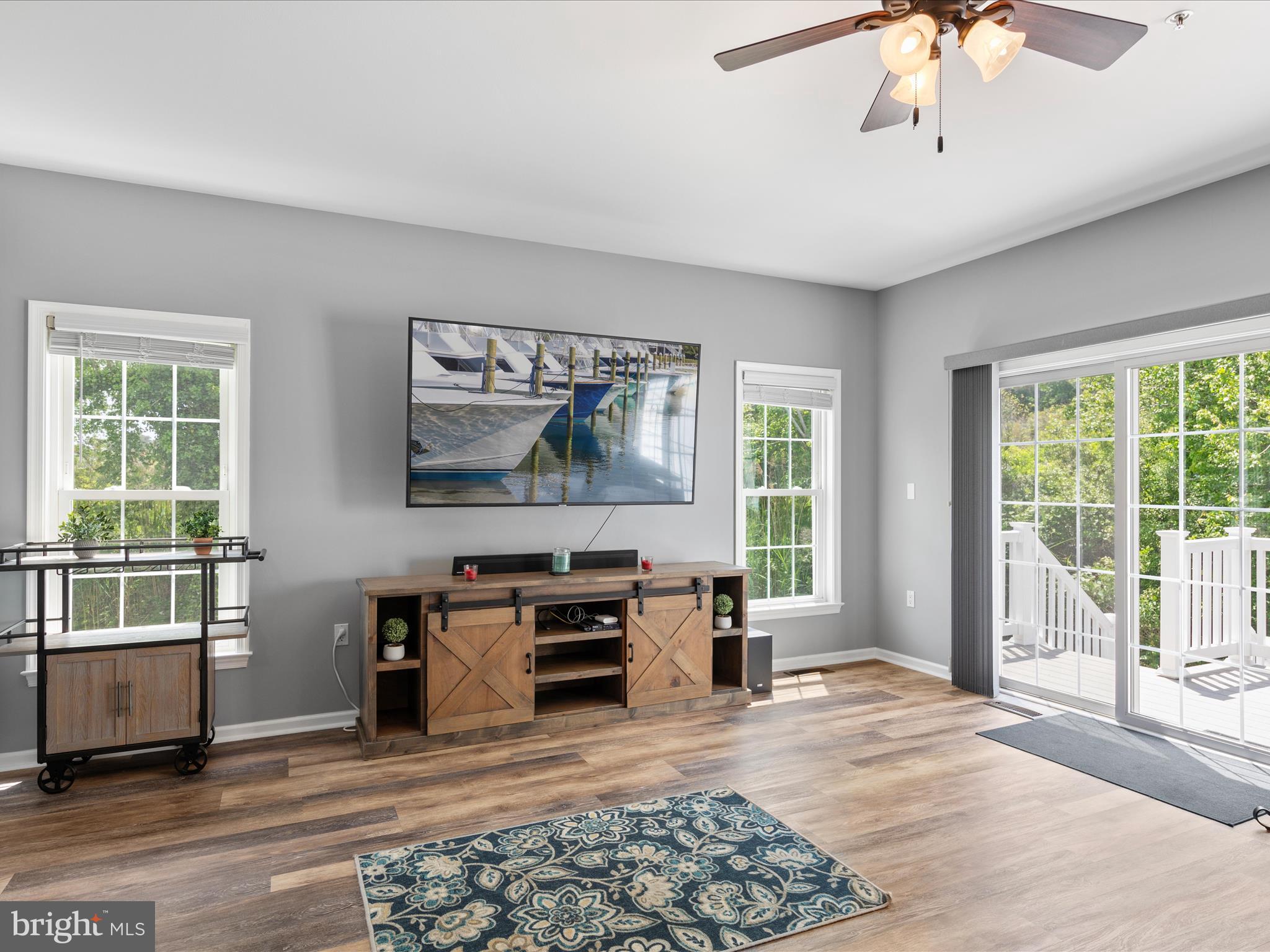 9739 Golf Course Road, Unit D102 Ocean City, MD 21842 - Photo 17 of 78 a living room with furniture a window and a dining table