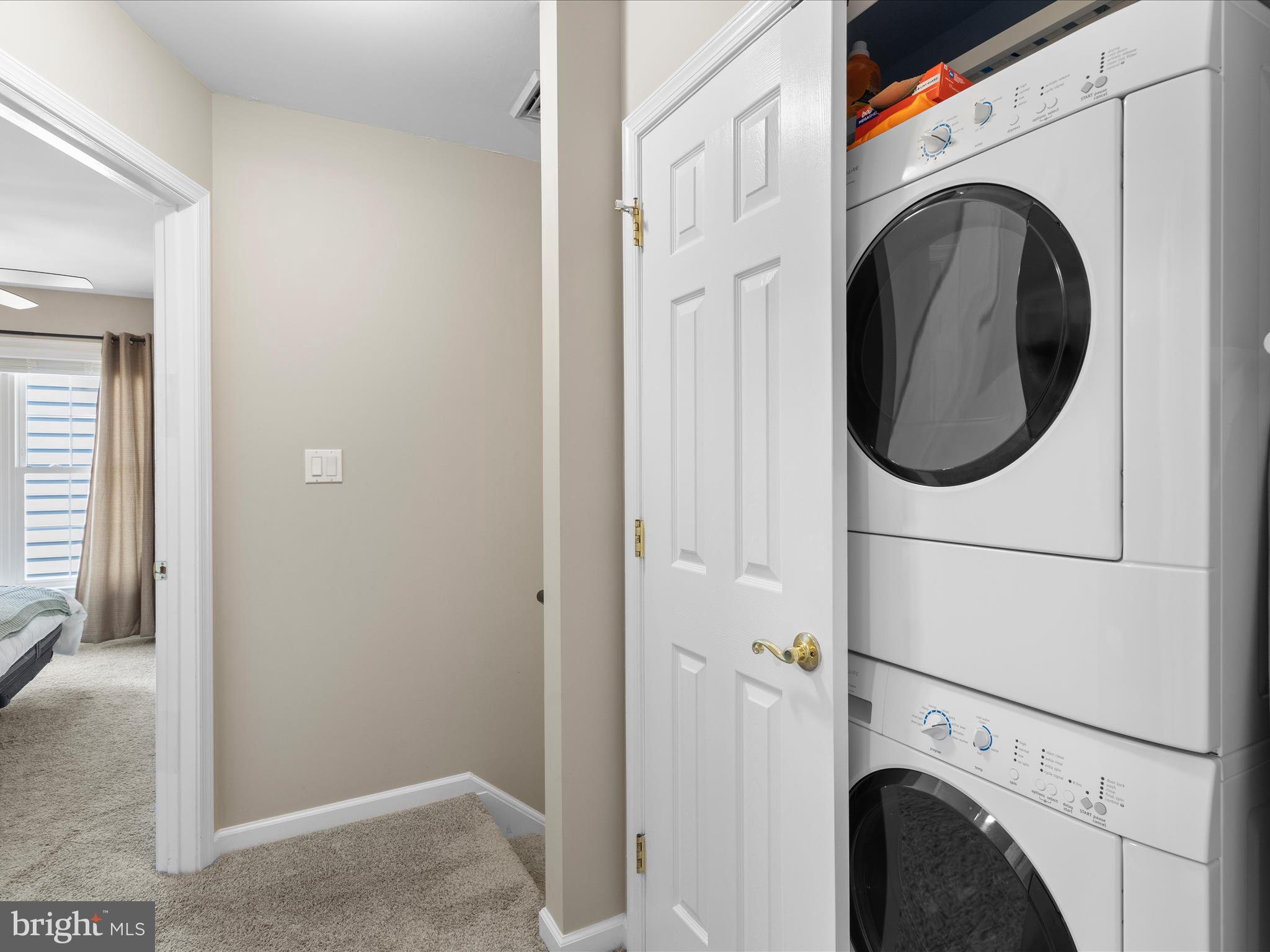 9739 Golf Course Road, Unit D102 Ocean City, MD 21842 - Photo 59 of 78 a utility room with dryer and washer