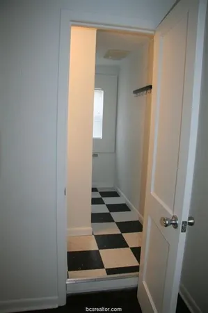 a picture of a bathroom with a sink and a mirror