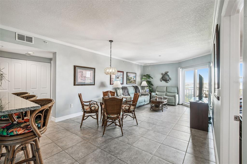 4516 Seagull Drive, Unit 807 New Port Richey, FL 34652 - Photo 13 of 100 a view of a livingroom with furniture and window