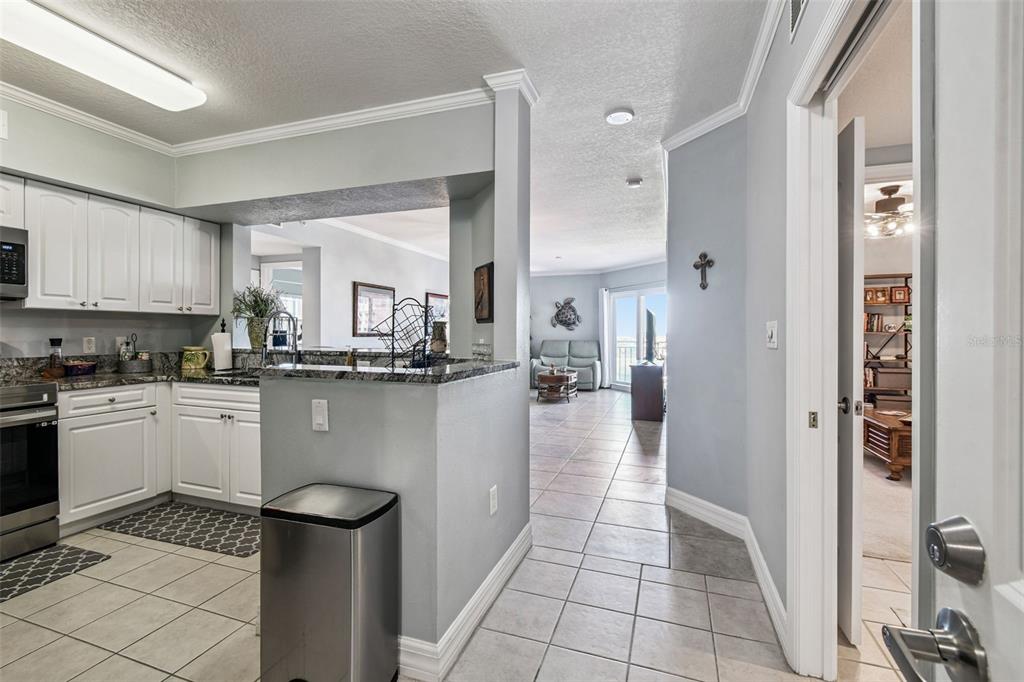 4516 Seagull Drive, Unit 807 New Port Richey, FL 34652 - Photo 5 of 100 a kitchen with counter top space and appliances