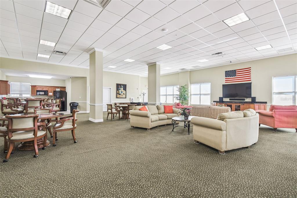 4516 Seagull Drive, Unit 807 New Port Richey, FL 34652 - Photo 53 of 100 a living room with furniture and a large window