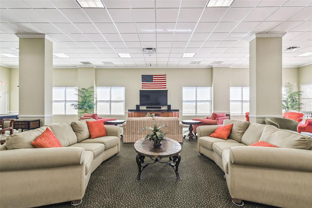 4516 Seagull Drive, Unit 807 New Port Richey, FL 34652 - Photo 54 of 100 a living room with furniture and a large window
