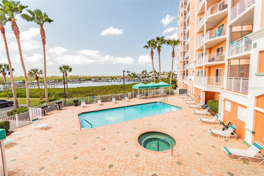 4516 Seagull Drive, Unit 807 New Port Richey, FL 34652 - Photo 67 of 100 a view of a swimming pool with a terrace