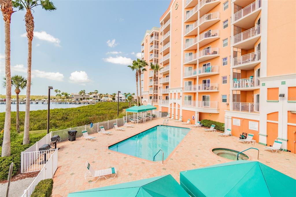 4516 Seagull Drive, Unit 807 New Port Richey, FL 34652 - Photo 68 of 100 a view of a swimming pool and a terrace