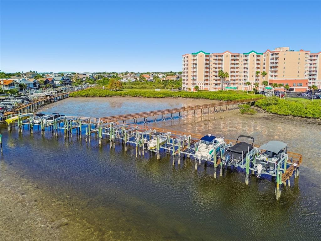 4516 Seagull Drive, Unit 807 New Port Richey, FL 34652 - Photo 71 of 100 a view of ocean with boats and trees in the background