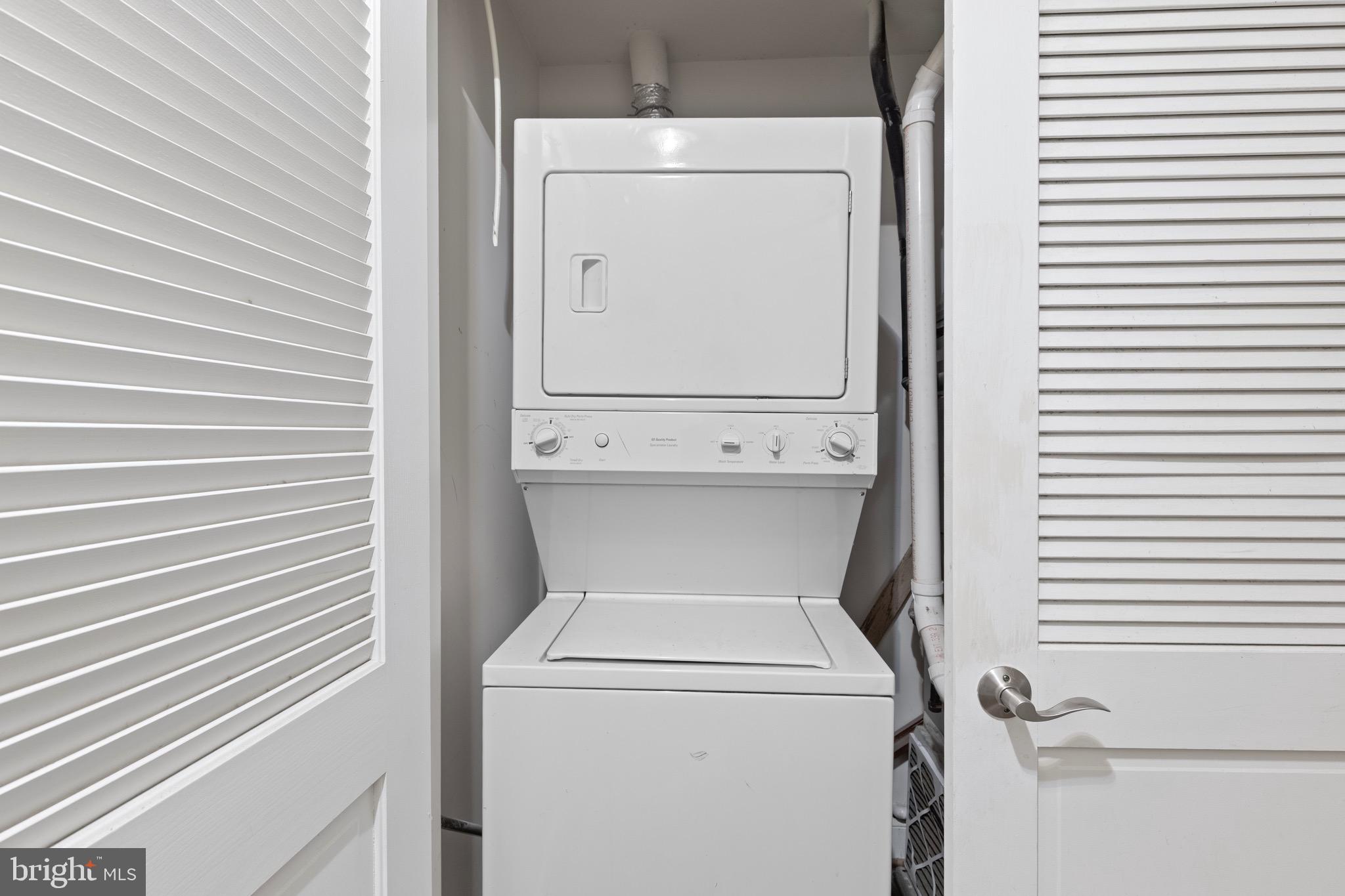 1210 R Street Northwest, Unit B1 Washington, DC 20009 - Photo 13 of 15 a utility room with dryer and washer