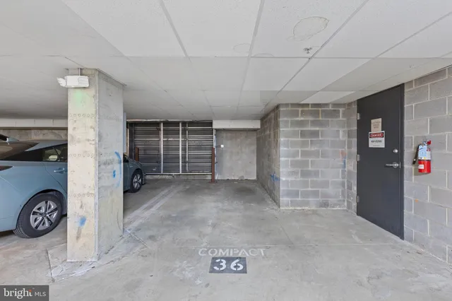 a view of a hallway with a chandelier
