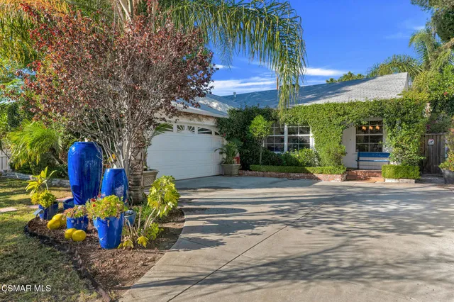 a view of a street with sitting area