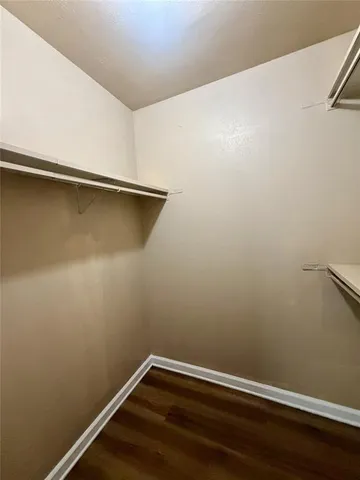 a view of small space with racks on the wall