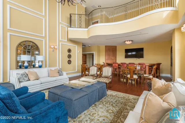 a view of a lake with boats and trees in the background