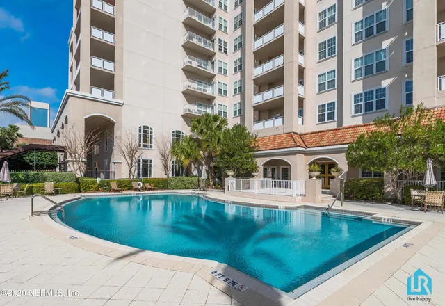a bathroom with a sink a mirror and a shower
