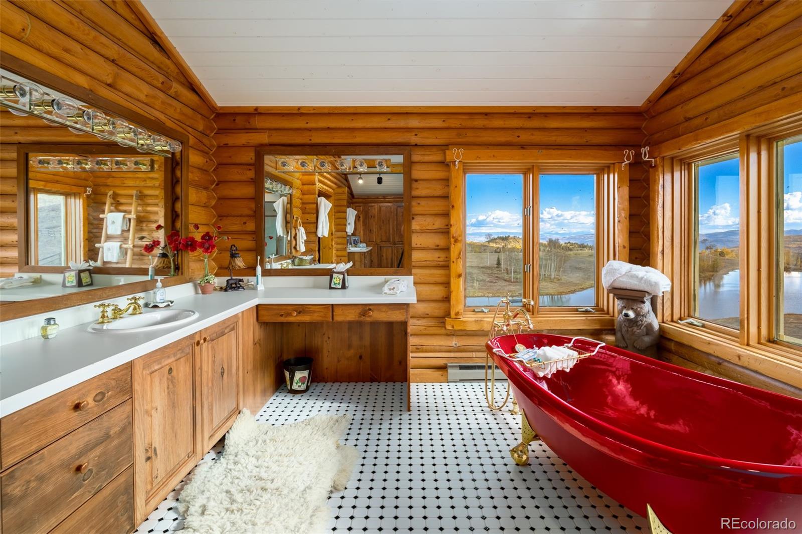 34755 Long Ridge Drive Toponas, CO 80479 - Photo 19 of 40 a large kitchen with stainless steel appliances granite countertop a sink and cabinets