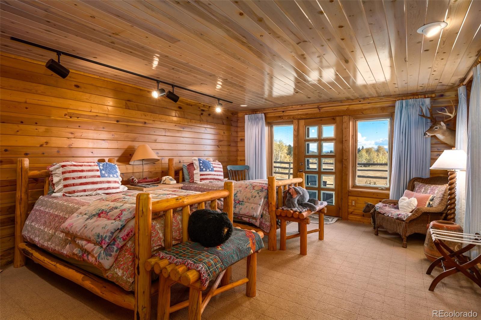 34755 Long Ridge Drive Toponas, CO 80479 - Photo 21 of 40 a living room with furniture and a large window