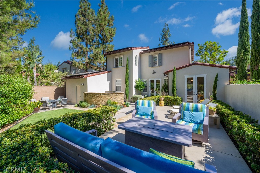 128 White Flower Irvine, CA 92603 - Photo 1 of 13 a outdoor living space with furniture and garden view