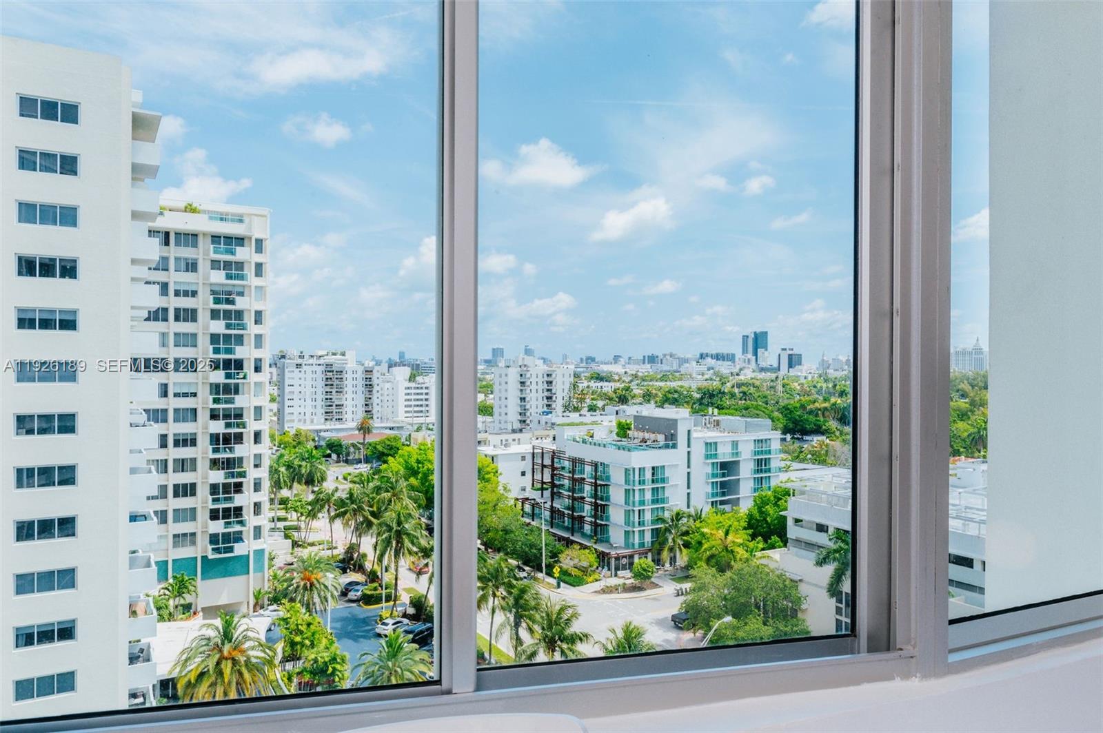 1100 West Avenue, Unit 1004 Miami Beach, FL 33139 - Photo 11 of 22 a view of a lot of buildings from a window