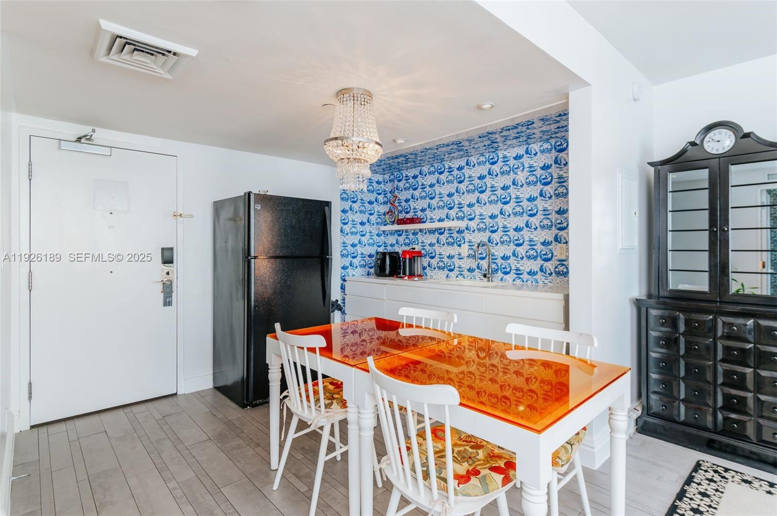 1100 West Avenue, Unit 1004 Miami Beach, FL 33139 - Photo 2 of 22 a room with pool table and window