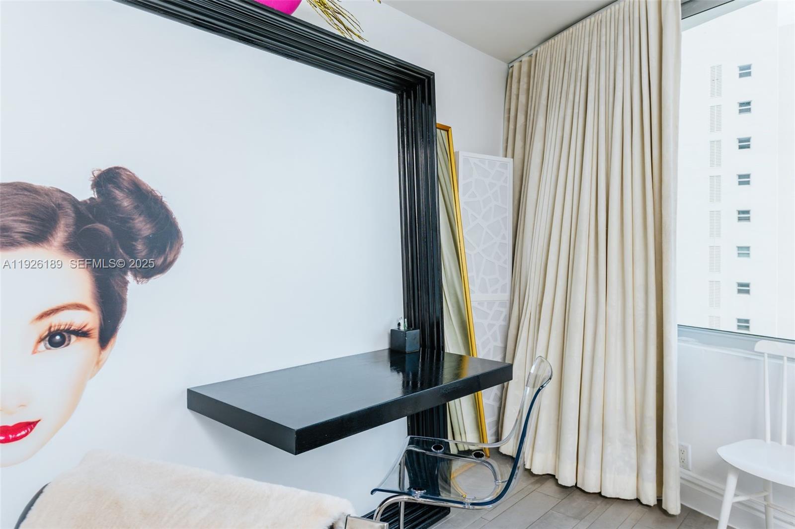 1100 West Avenue, Unit 1004 Miami Beach, FL 33139 - Photo 10 of 22 a view of a room with gym equipment