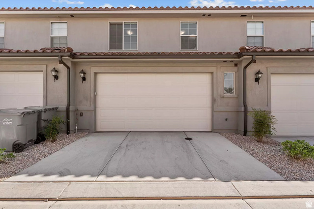 1166 North Riviera Alley Washington, UT 84780 - Photo 20 of 26 Mediterranean / spanish house featuring stucco siding, concrete driveway, and a garage