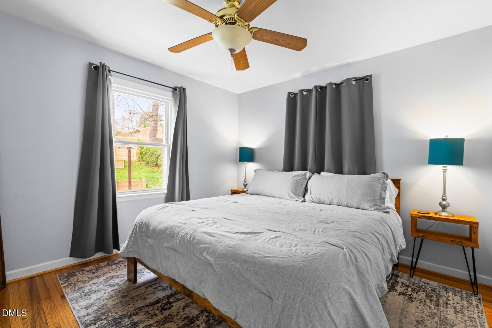 1405 Marlborough Road Raleigh, NC 27610 - Photo 16 of 33 a bedroom with a bed and a window