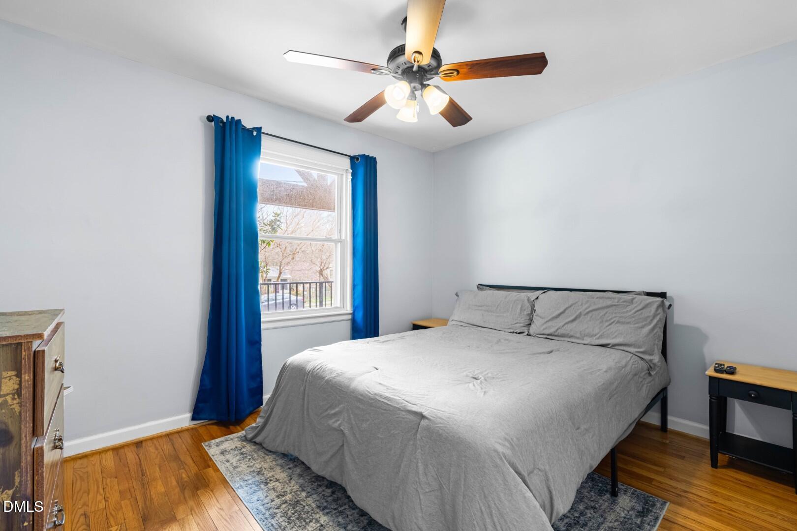 1405 Marlborough Road Raleigh, NC 27610 - Photo 21 of 33 a bedroom with a bed and a window