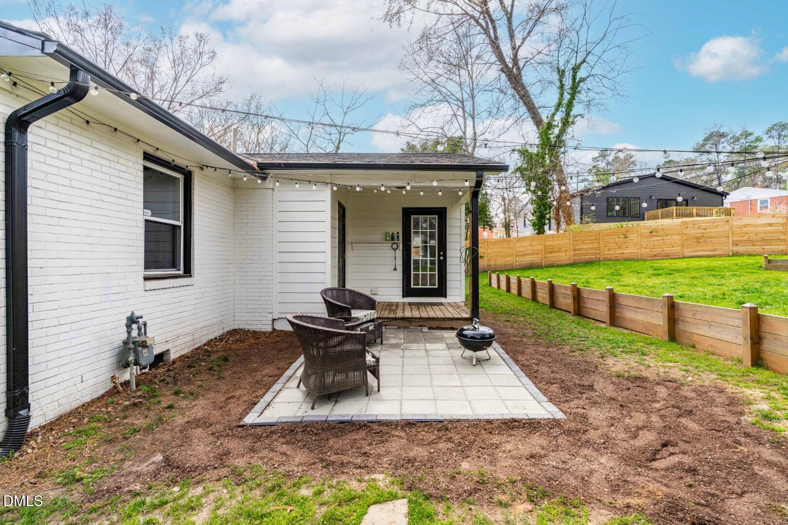 1405 Marlborough Road Raleigh, NC 27610 - Photo 29 of 33 a view of a backyard with sitting area