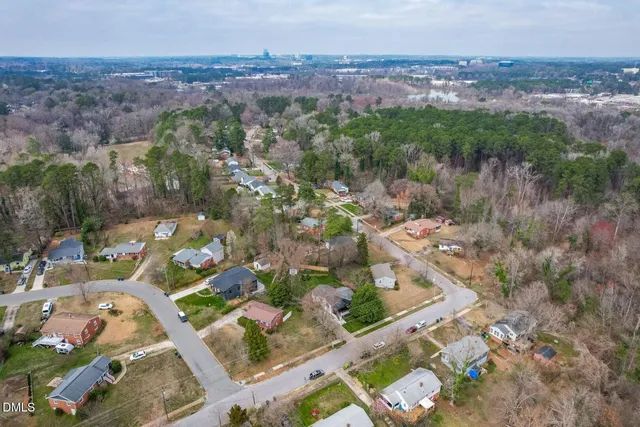 an aerial view of residential house with outdoor space