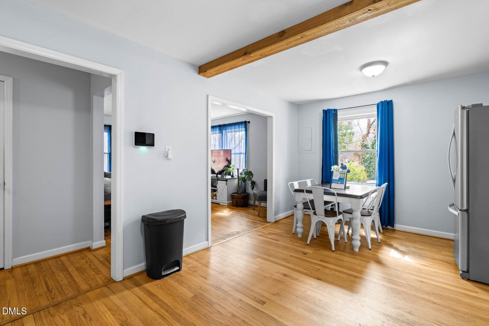 1405 Marlborough Road Raleigh, NC 27610 - Photo 9 of 33 a view of a dining room with furniture and wooden floor