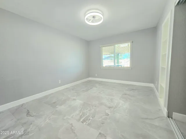 an empty room with a window