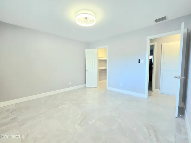 an empty room with a natural light