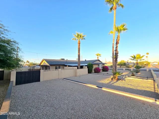 a view of a house with basketball court