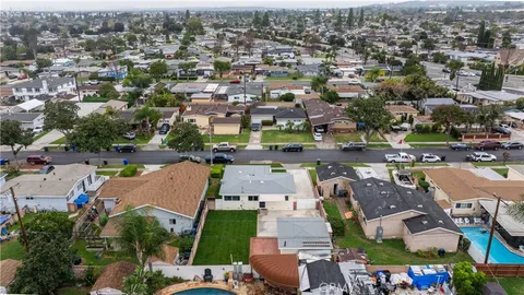 an aerial view of a city with lots of residential buildings
